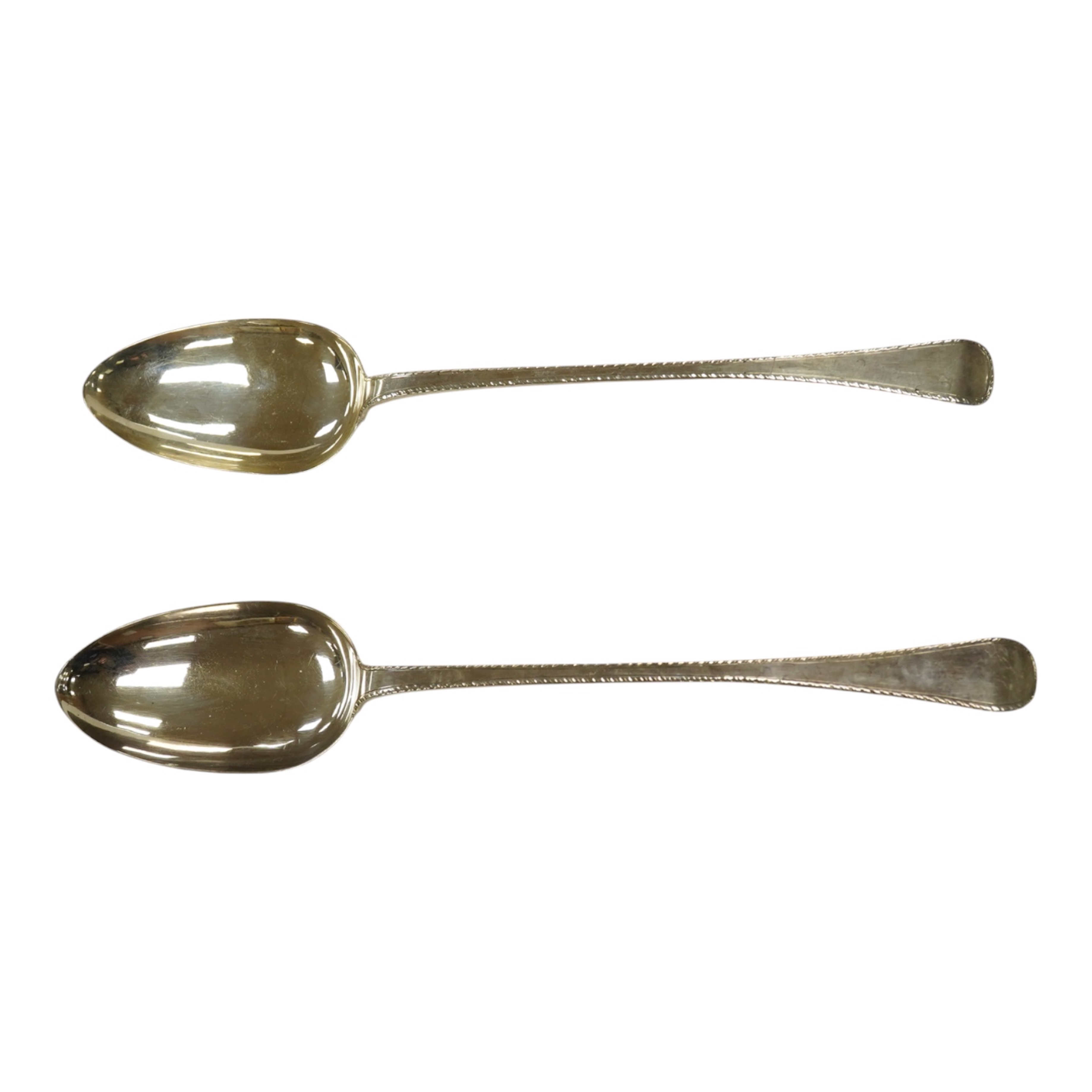 A pair of early Victorian Scottish silver Old English feather edge pattern basting spoons, Marshall & Sons, Edinburgh, 1840, 30cm, 5.8oz. Condition - fair